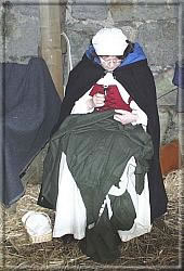 A sempstress keeps garments in good repair.