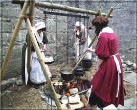 Soldiers' wives preparing food.