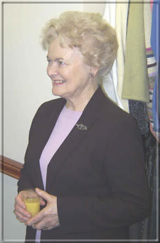 Nadene Crowther, who was responsible for establishing the six Hospice shops, looks on.