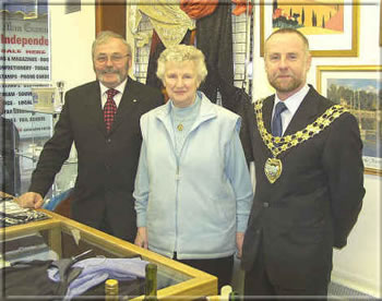 Anne Clague pictured with Tony Brown SHK, and Mr. John Cringle, Chairman of Castletown Commissioners